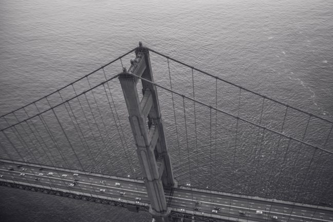 black and white Drone view of San Francisco Golden Gate Bridge.