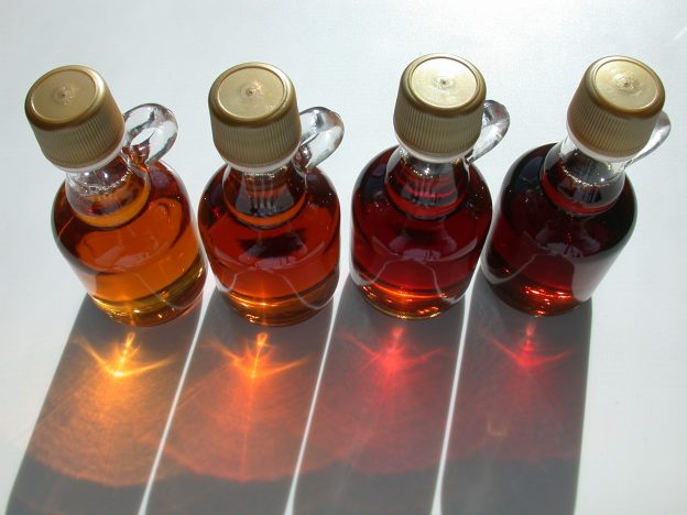 Four bottles of maple syrup