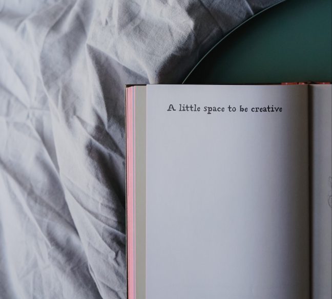 Open book with text "a little space to be creative"